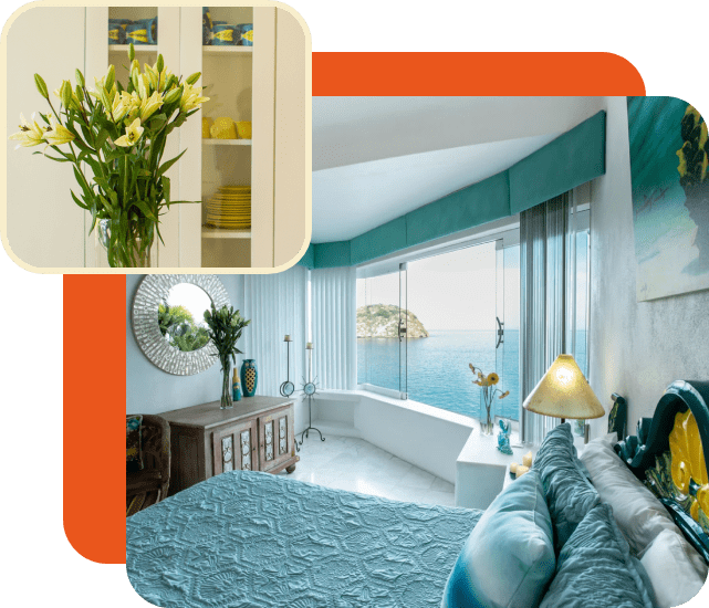 Cozy bedroom with teal accents and fresh flowers.