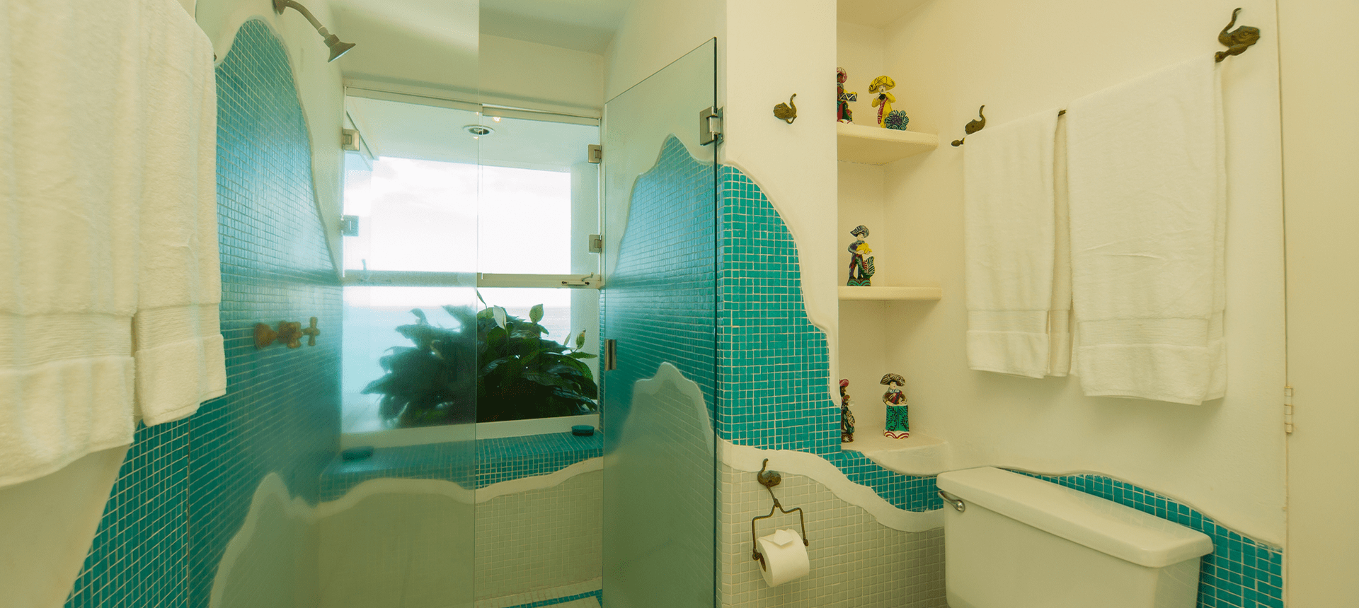 Stylish bathroom with glass shower enclosure