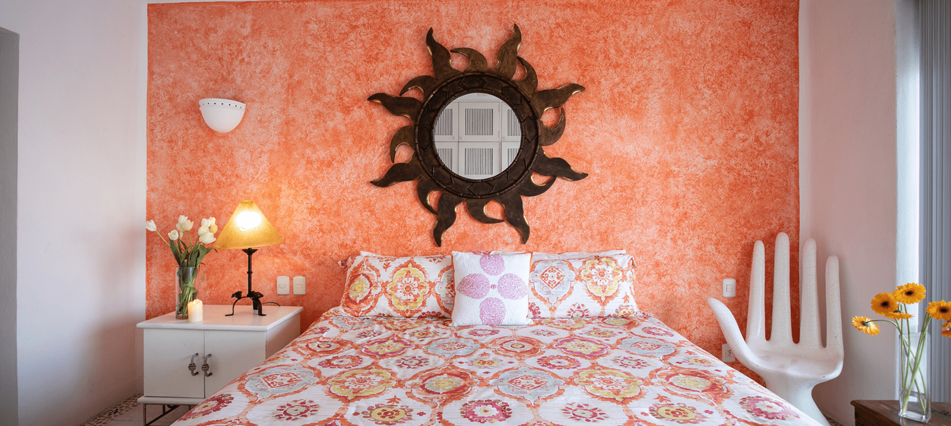 Bright bedroom with patterned bedding