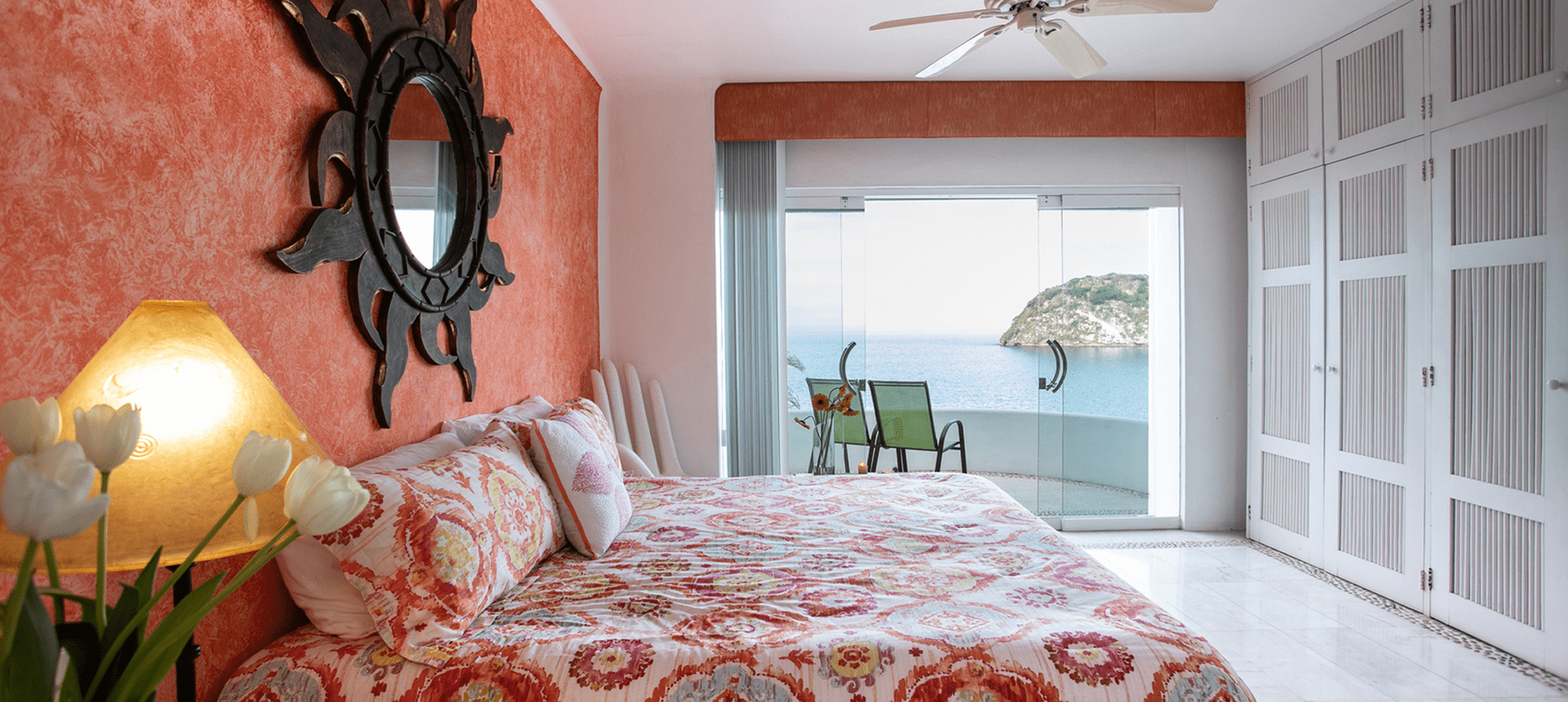 Bedroom with ocean view balcony