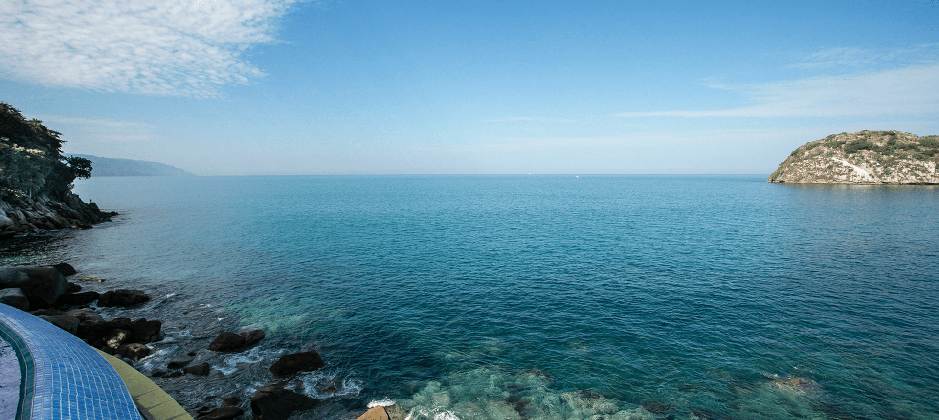 Tranquil blue waters and distant hills